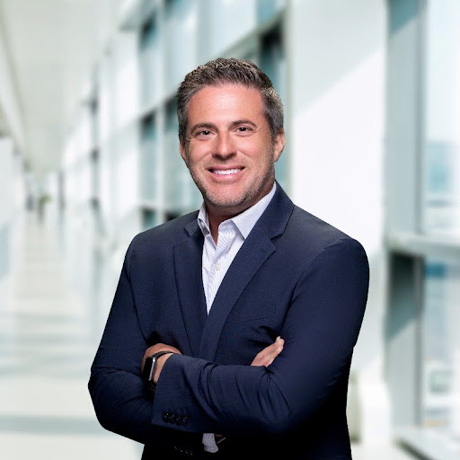 Man smiling wearing coat